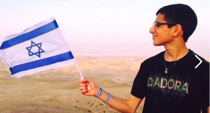 Mohammad Zoabi holding the Israeli flag - non-Jews can be Zionists