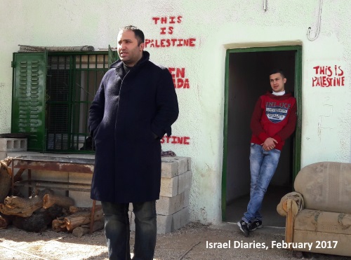 Issa Amro talking to group