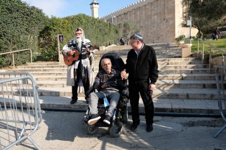 man in wheelchair cannot hope to climb steps into the Cave of the Patriarchs