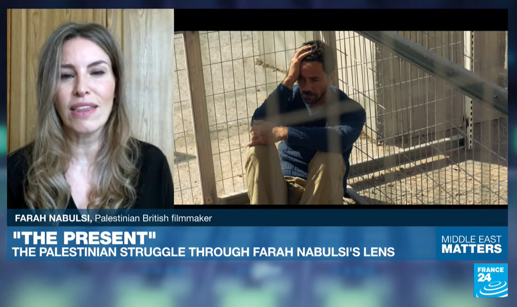 Yosuf in a cage next to the checkpoint