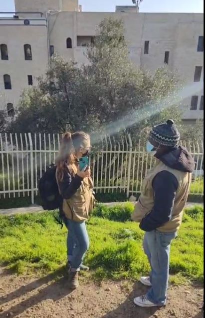 EAPPI activists with Beit Hadassa behind them
