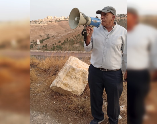 Elie Joseph demonstrating against weapons sales